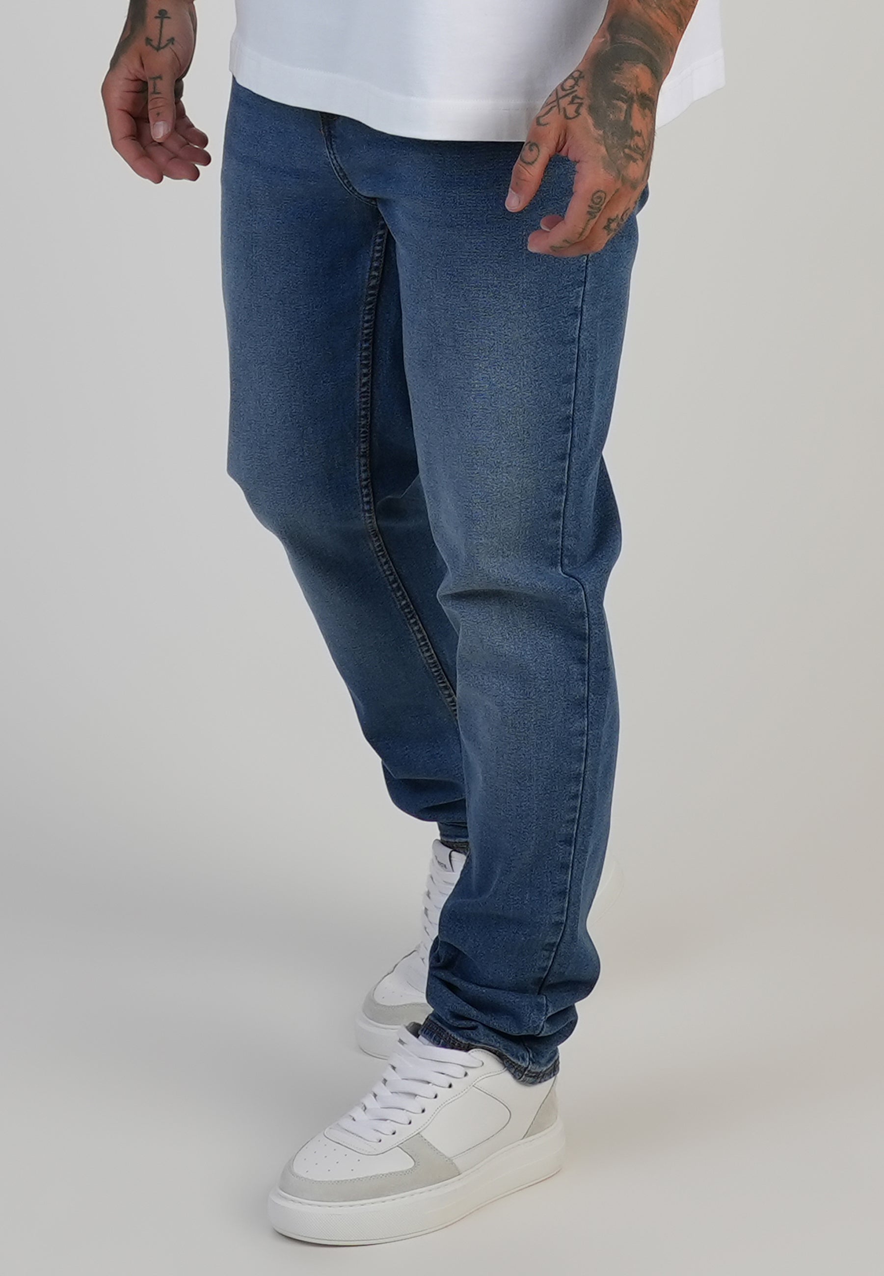 Slim Fit Jeans in Washed Mid Blue Jeans SikSilk